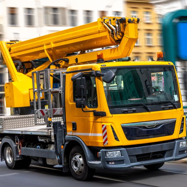 Yellow heavy duty crane truck.